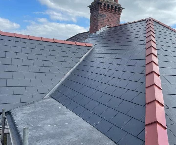 Finished slate roof by Check A Leak